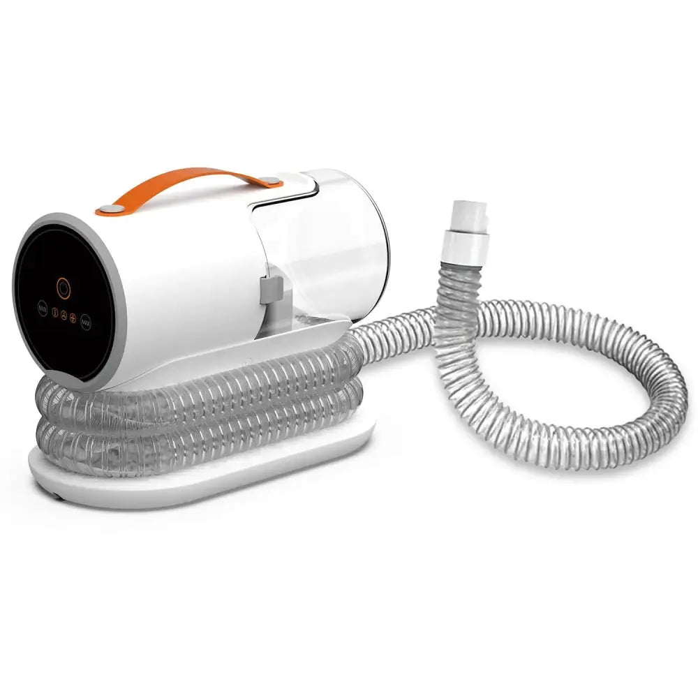 White portable CPAP machine with orange handle and corrugated hose in AIRROBO PG100 kit