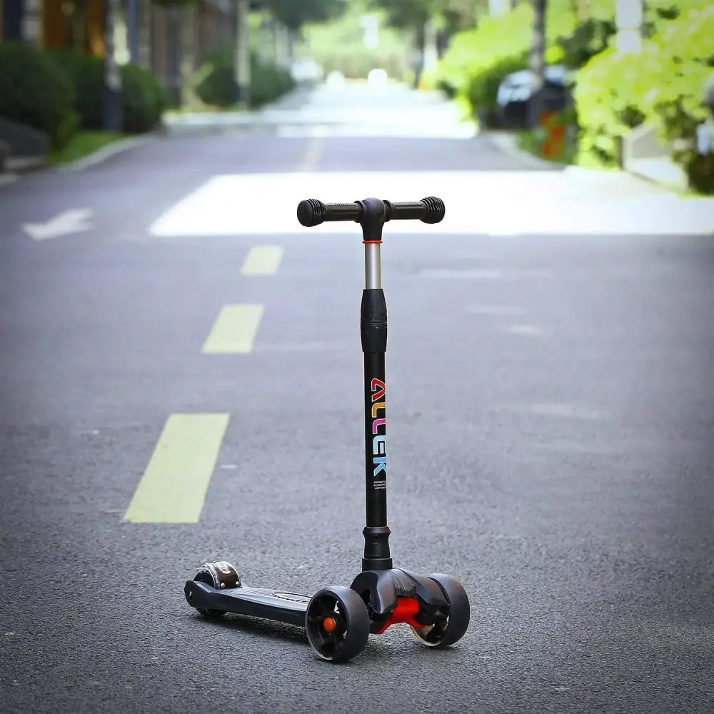 Black three-wheeled scooter from Illuminated Three Wheel Scooter Variant Total