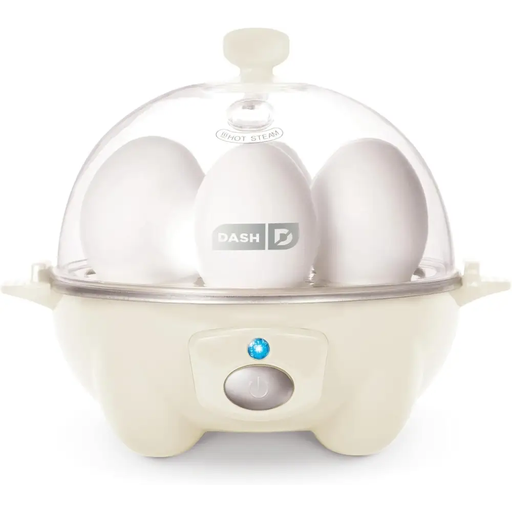 Cream-colored Dash Rapid Egg Cooker with clear dome for perfect egg cooking