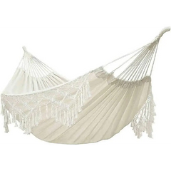 White fringed Macrame Hammock for comfortable outdoor relaxation and bohemian style