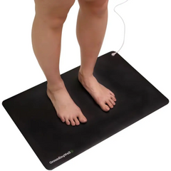 Black grounding mat with white cord from GroundingWell for natural healing and enhanced sleep