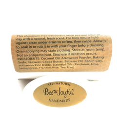 Bee Joyful Patchouli Lime Natural Beeswax Deodorant Stick on a neutral background