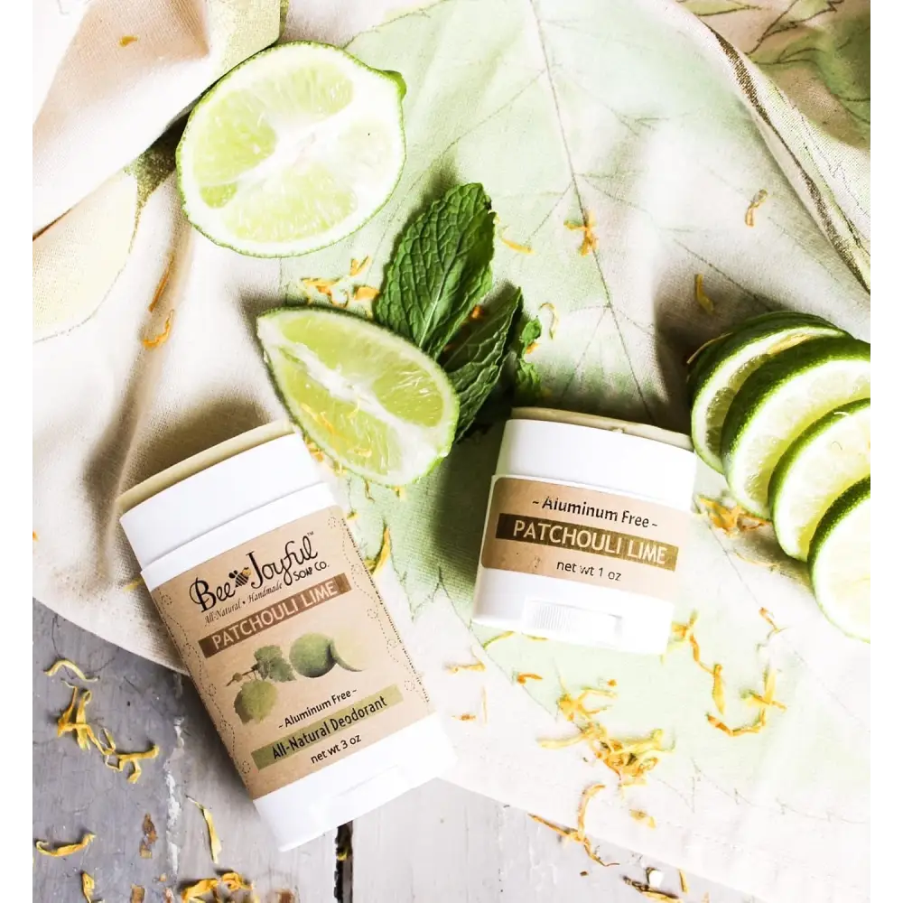 Two containers of Bee Joyful Patchouli Lime Natural Beeswax Deodorant Stick