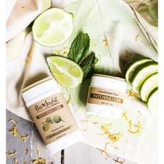 Two containers of Bee Joyful Patchouli Lime Natural Beeswax Deodorant Stick