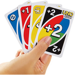 Hand holding Uno cards from Uno Flip Action Packed Double Sided Deck Card Game