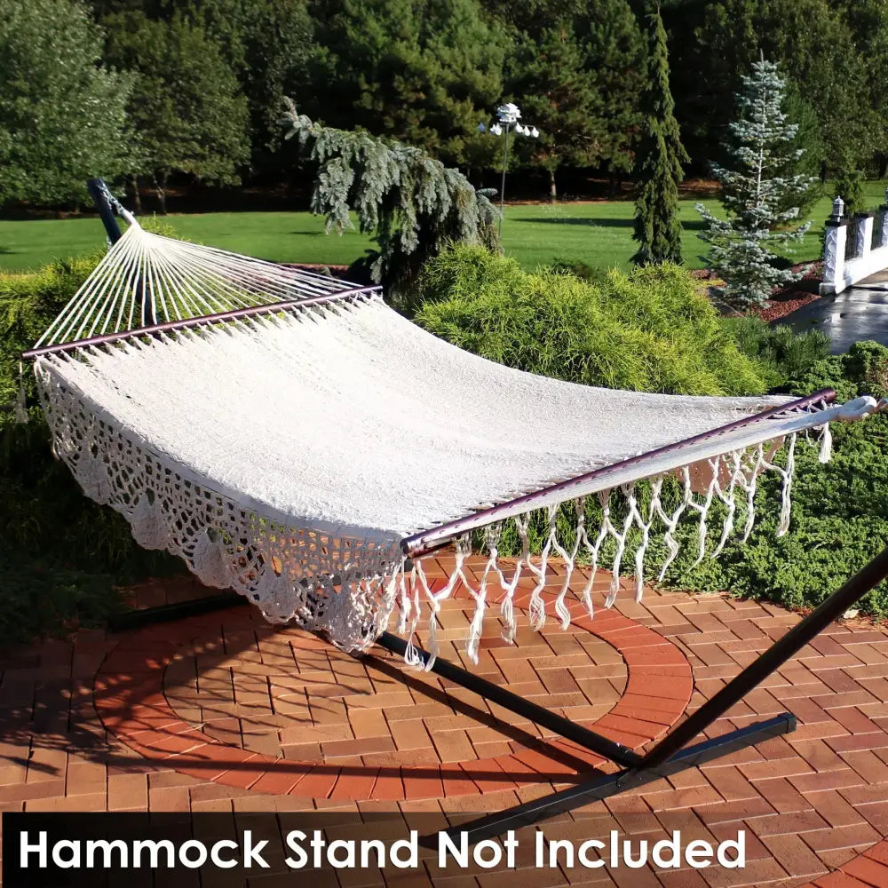 White crocheted hammock from Sunnydaze 2-Person Cotton Spreader Bar Hammock set